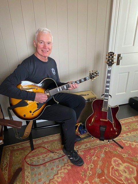 Donald Olson with his two Conti Guitars