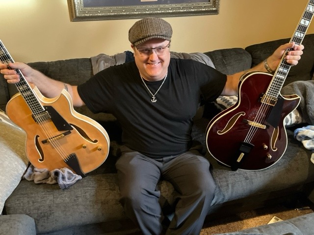 James with a big smile and his two Conti Entrada Archtop Guitars!