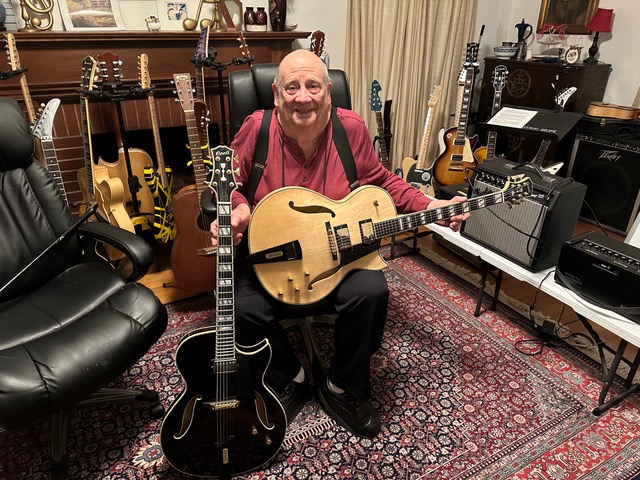 Pete Sternloff, collector of many guitars takes a moment to pose with his two Conti Entrada archtop jazz guitars!