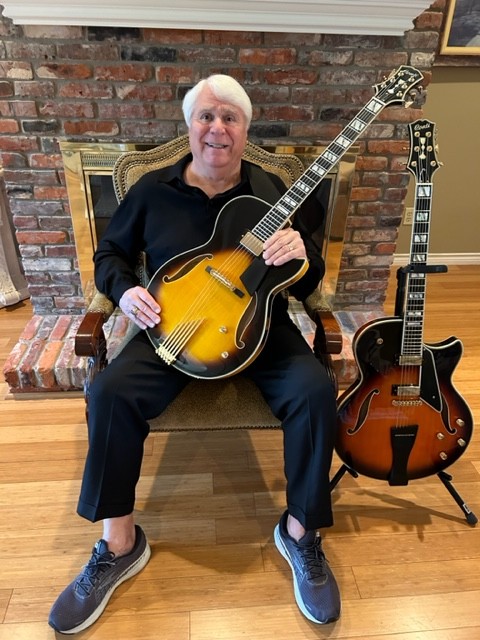 Elliott joins the Two Conti club as he displays his new 15 inch Sunburst Entrada archtop jazz guitar, alongside his first gen Equity model.