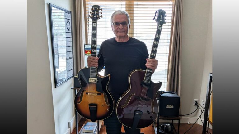 Lonnie Smith takes a moment to pose with his TWO Conti Entrada archtop jazz guitars