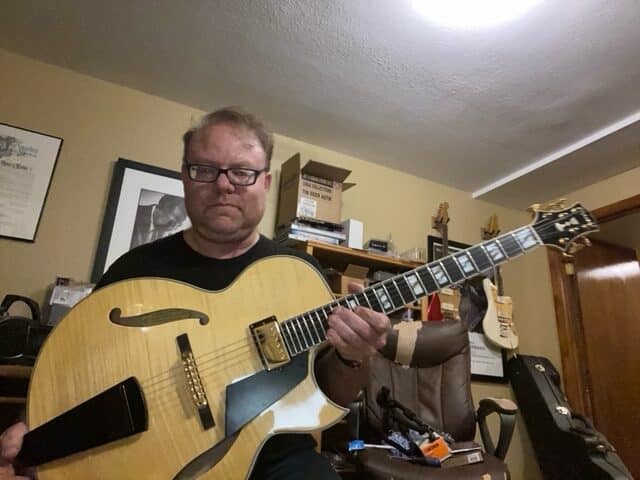 Steve Scheller with his natural blonde Conti Entrada archtop jazz guitar